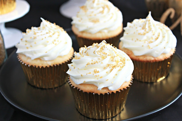 Sparkler Vanilla Bean Cupcakes with White Chocolate Frosting from LoveandConfections.com