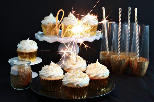 Sparkler Vanilla Bean Cupcakes with White Chocolate Frosting from LoveandConfections.com