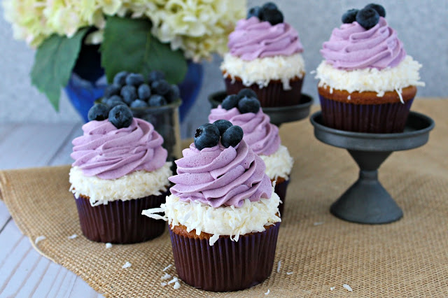 Coconut Cupcakes with Coconut and Blueberry Frosting from LoveandConfections.com #BrunchWeek