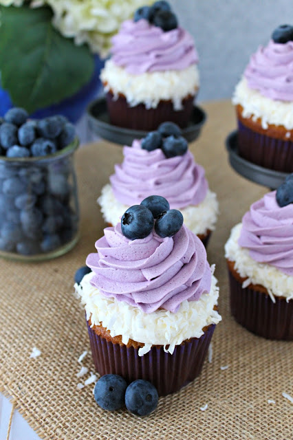 Coconut Cupcakes with Coconut and Blueberry Frosting from LoveandConfections.com #BrunchWeek