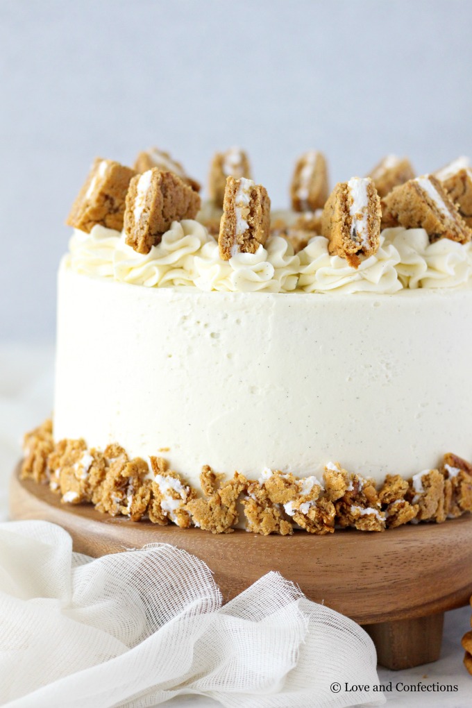 Oatmeal Cream Pie Layer Cake - oatmeal brown sugar layer cake, marshmallow frosting filling, and vanilla bean buttercream with oatmeal cream pie garnish