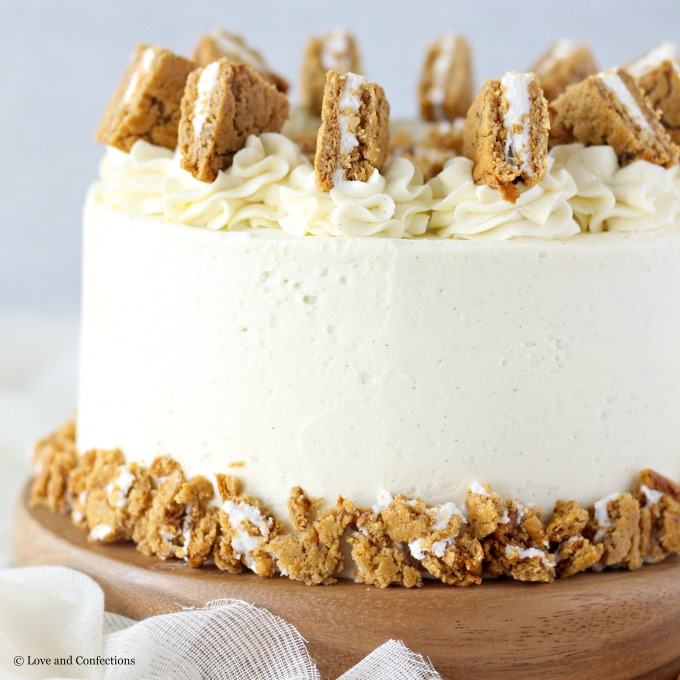 Oatmeal Cream Pie Layer Cake - oatmeal brown sugar layer cake, marshmallow frosting filling, and vanilla bean buttercream with oatmeal cream pie garnish