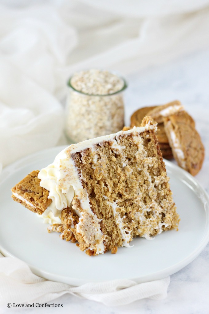 Oatmeal Cream Pie Layer Cake - oatmeal brown sugar layer cake, marshmallow frosting filling, and vanilla bean buttercream with oatmeal cream pie garnish