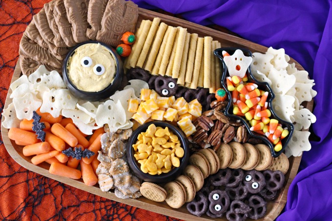 Kid-Friendly Halloween Snack Board featuring both store-bought and semi-homemade treats