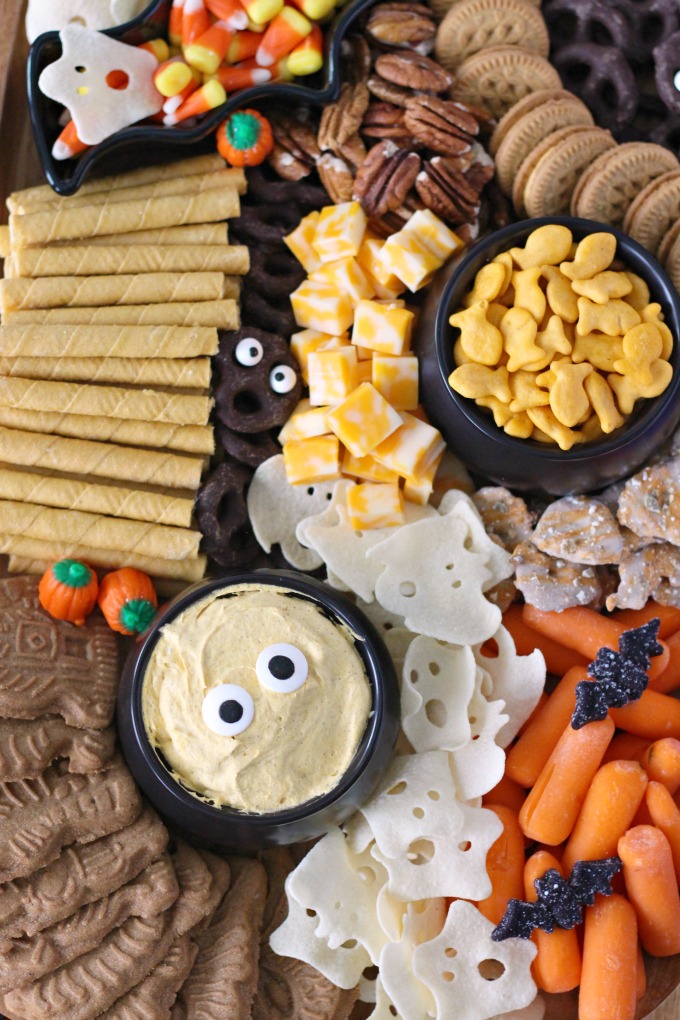 Kid-Friendly Halloween Snack Board featuring both store-bought and semi-homemade treats