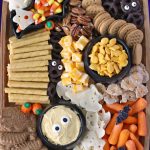 Kid-Friendly Halloween Snack Board featuring both store-bought and semi-homemade treats