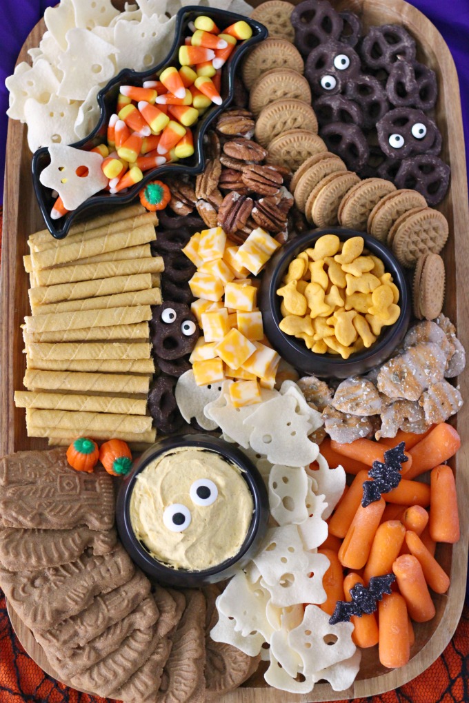 Kid-Friendly Halloween Snack Board featuring both store-bought and semi-homemade treats